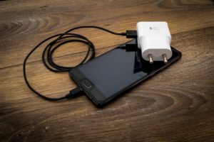  a smartphone and a usb cable
